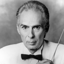 A photograph of composer Bill Conti
