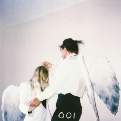 001/Runnin' (Wings of Desire) [7" vinyl] (album cover artwork)